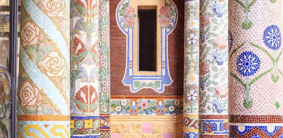 Ornate tile mosaic adorns the interior of Palau de la Música Catalana, a renowned concert hall in Barcelona.