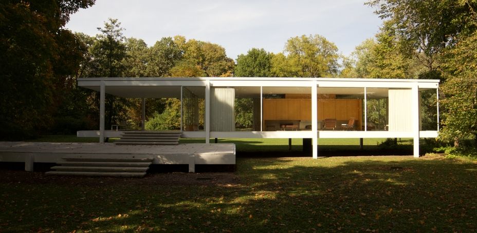 Farnsworth House, a modern architectural landmark nestled amidst lush greenery.